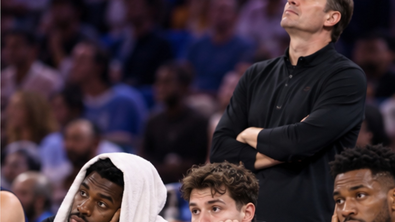 Satirical editorial image of a dejected basketball bench during a one-sided game.