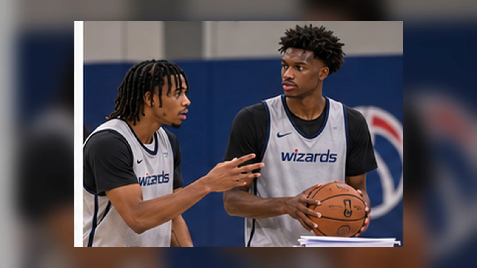 Current Wizards players Bub Carrington and AJ Dybantsa discuss Washington strategy during a satirical practice scene.